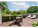 Inviting back deck featuring a dining set and lounge chairs at 293 E Quail Wood Ln, Westfield, IN 46074
