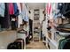 Walk-in closet with custom shelving and ample storage for clothing and accessories at 293 E Quail Wood Ln, Westfield, IN 46074