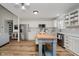 Bright kitchen with white cabinetry, stainless steel appliances, and a butcher block island at 293 E Quail Wood Ln, Westfield, IN 46074