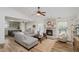 Open-concept living room with fireplace, and view into the kitchen and dining area at 293 E Quail Wood Ln, Westfield, IN 46074