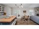 Bright and airy living room, showcasing open floor plan with fireplace and dining area adjacent to a well-equipped kitchen at 293 E Quail Wood Ln, Westfield, IN 46074