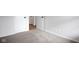 A view of a bedroom with plush carpeting and newly painted white walls at 3148 Arbutus Dr, Indianapolis, IN 46224