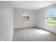 An empty bedroom with two windows offering plenty of natural light at 3148 Arbutus Dr, Indianapolis, IN 46224