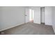 A neutral bedroom featuring a closet and a view into the hall at 3148 Arbutus Dr, Indianapolis, IN 46224