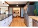 Spacious kitchen features a pantry with sliding doors and ample storage, plus stainless steel appliances at 321 N Rangeline Rd, Carmel, IN 46032
