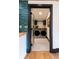 Charming laundry room featuring tile flooring and modern machines, with beautiful tiling outside the doorway at 321 N Rangeline Rd, Carmel, IN 46032