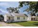 Charming house with cozy front porch and well-maintained yard at 321 S Biltmore Ave, Indianapolis, IN 46241
