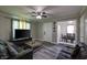 Well-lit living room open to the dining area, offering a cozy atmosphere at 321 S Biltmore Ave, Indianapolis, IN 46241