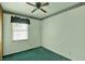 Cozy bedroom with carpet and a window at 3425 Ireland Dr, Indianapolis, IN 46235