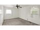 Bright bedroom with carpet and natural lighting from two windows at 3425 Ireland Dr, Indianapolis, IN 46235