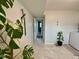 A bright hallway with tile flooring and doorway views at 3520 Lantern Ln, Columbus, IN 47203