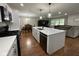 Spacious kitchen and living room offering ample seating and modern appliances at 3520 Lantern Ln, Columbus, IN 47203