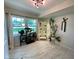 A bright laundry room with tile flooring, decor, and a large window at 3520 Lantern Ln, Columbus, IN 47203