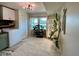 Bright laundry room with tile flooring, washer, shelving and plenty of natural light at 3520 Lantern Ln, Columbus, IN 47203