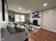 Comfortable living room features a modern fireplace, cozy seating, and plenty of natural light at 3520 Lantern Ln, Columbus, IN 47203