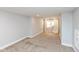 Finished basement area with plush carpeting, window, and neutral paint at 4048 N College Ave, Indianapolis, IN 46205