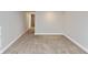 Large, finished basement with carpet and neutral walls, perfect for flexible living at 4048 N College Ave, Indianapolis, IN 46205