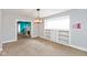 Light-filled dining area showcasing built-in shelves and nearby living areas at 4048 N College Ave, Indianapolis, IN 46205