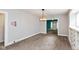 Bright dining room with a stylish light fixture and ample space at 4048 N College Ave, Indianapolis, IN 46205