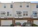 Townhome exterior showing the garage, balcony, and well-maintained facade at 420 Beverly Ct, Carmel, IN 46032