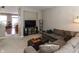 Open living room area showcasing neutral tones, carpet flooring, and seamless flow to other spaces at 420 Beverly Ct, Carmel, IN 46032