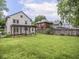 Spacious backyard with a pergola-covered patio, ideal for outdoor relaxation and entertaining at 4455 Central Ave, Indianapolis, IN 46205