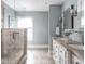 Bathroom featuring a glass shower, double vanity, and updated fixtures, offering a luxurious experience at 4455 Central Ave, Indianapolis, IN 46205