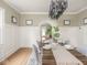 Dining room showcasing table setting, lighting, and trim at 4455 Central Ave, Indianapolis, IN 46205