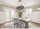Dining area with modern lighting, table setting, and bright lighting at 4455 Central Ave, Indianapolis, IN 46205