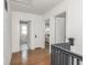 Upstairs hallway showing access to the bathroom and bedrooms at 4455 Central Ave, Indianapolis, IN 46205