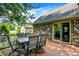 Wooden deck area featuring patio seating area for enjoying the outdoors at 47 Oakwood Ct, Brownsburg, IN 46112