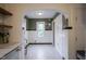 Dining area is adjacent to the kitchen and features an arched doorway at 5435 E 10Th St, Indianapolis, IN 46219