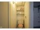 Small basement toilet room with concrete walls and ceiling next to the garage at 5435 E 10Th St, Indianapolis, IN 46219