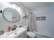 Charming bathroom featuring subway tile shower, modern fixtures, and stylish design at 5516 W Minnesota St, Indianapolis, IN 46241