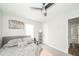 Comfortable bedroom with a neutral palette, ceiling fan, and ample natural light at 5516 W Minnesota St, Indianapolis, IN 46241