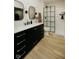 Stylish bathroom featuring modern vanity with double mirrors and an updated shower with glass enclosure at 5686 Ellie Ct, Noblesville, IN 46062