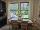 Dining room showcasing natural light through windows viewing the backyard at 5686 Ellie Ct, Noblesville, IN 46062