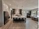 Bright kitchen features an oversized island with seating and stainless steel appliances at 5686 Ellie Ct, Noblesville, IN 46062