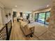 Spacious living room features large windows and flows into the outdoor living area at 5686 Ellie Ct, Noblesville, IN 46062