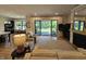 Inviting living room featuring large sliding doors and a cozy fireplace at 5686 Ellie Ct, Noblesville, IN 46062