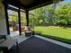 View of the backyard from the covered patio that includes an outdoor kitchen at 5686 Ellie Ct, Noblesville, IN 46062