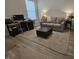 Cozy room with a desk, couch, and a large area rug at 5686 Ellie Ct, Noblesville, IN 46062
