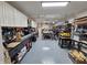 Spacious workshop featuring ample storage, workbenches, and a variety of tools at 5686 Ellie Ct, Noblesville, IN 46062