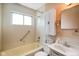 Bright bathroom featuring a shower-tub combo, with coordinated fixtures and vanity at 623 Circle Ct, Whiteland, IN 46184
