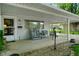 Cozy covered front porch with seating, offering a welcoming entrance to the home and relaxed outdoor living at 623 Circle Ct, Whiteland, IN 46184