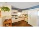 Bright kitchen with white cabinets, neutral countertops, and ample storage space at 623 Circle Ct, Whiteland, IN 46184