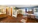 Open-concept living space featuring a dining area, kitchen, and comfortable living area with brown carpet at 623 Circle Ct, Whiteland, IN 46184