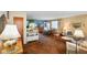 Inviting living room with warm-toned walls, comfortable seating, and open layout to dining area and kitchen at 623 Circle Ct, Whiteland, IN 46184