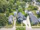 Beautiful aerial view of a modern home with a spacious yard and long driveway at 631 1St Nw Ave, Carmel, IN 46032