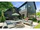Beautiful outdoor patio featuring a fire pit and comfortable seating, perfect for entertaining at 631 1St Nw Ave, Carmel, IN 46032